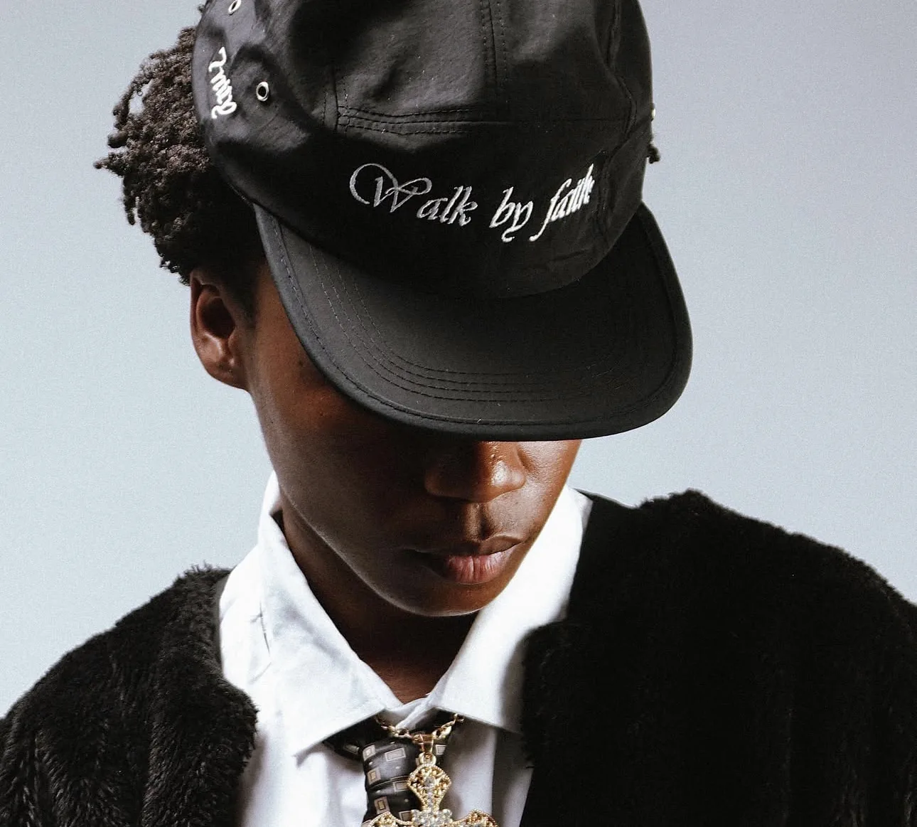 Close-up of the 7nity Walk By Faith 5-panel cap embroidery